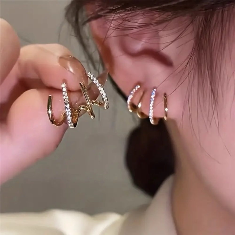 GOLD and Cubic Zirconia Claw Earrings